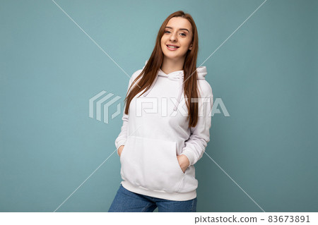 Photo of beautiful positive smiling adult woman wearing stylish clothes standing isolated on Photo of beautiful positive smiling adult woman wearing stylish clothes standing isolated on 83673891
