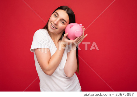 Portrait photo of happy cute smiling young beautiful attractive brunette woman with sincere emotions Portrait photo of happy cute smiling young beautiful attractive brunette woman with sincere emotions 83673897
