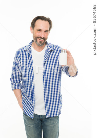 Health is precious. Mature man holding pill bottle. Senior 83674568