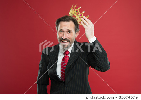 Winner at life. Successful prize winner putting crown Winner at life. Successful prize winner putting crown 83674579