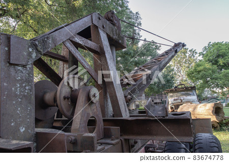 Loading heavy industrial old logging truck machine. Loading heavy industrial old logging truck machine. 83674778