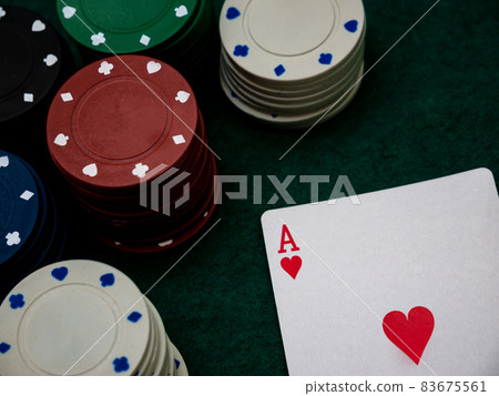 poker game table, single ace card score with stack of playing chips 83675561