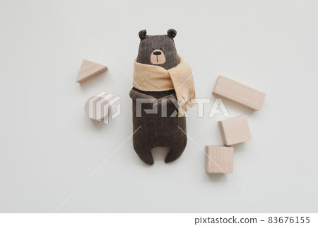 Eco-friendly colored wooden educational toys based on the Montessori method. Wooden toys, blocks, handmade toy bear on white background. Toys for kindergarten, preschool or daycare. Eco-friendly colored wooden educational toys based on the Montessori method. Wooden toys, blocks, handmade toy bear on white background. Toys for kindergarten, preschool or daycare. 83676155