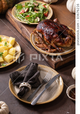 Classic dish roasted glazed duck with apples and garnish Classic dish roasted glazed duck with apples and garnish 83676216
