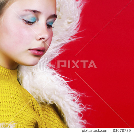 young pretty emitonal posing teenage girl on bright red background, happy smiling lifestyle people concept young pretty emitonal posing teenage girl on bright red background, happy smiling lifestyle people concept 83678789