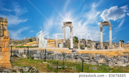 Ancient city of Hierapolis with statue of Pluto and columns in Pamukkale 83678885