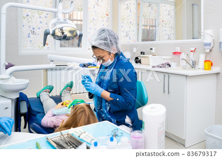 for Children use application anesthesia - gel is applied to gum before injection 83679317