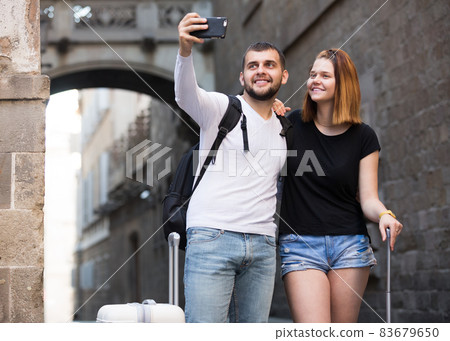 people are photographed in the street people are photographed in the street 83679650
