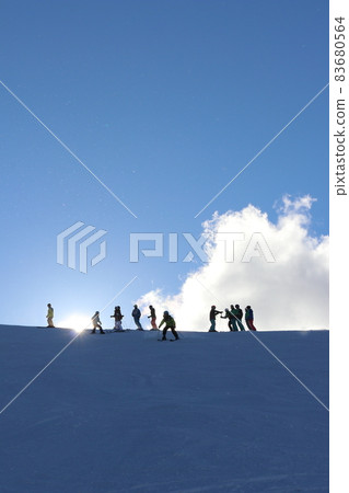 Ski border skier silhouette snow ski slope sun ski resort winter Sugadaira snow country blue sky 83680564