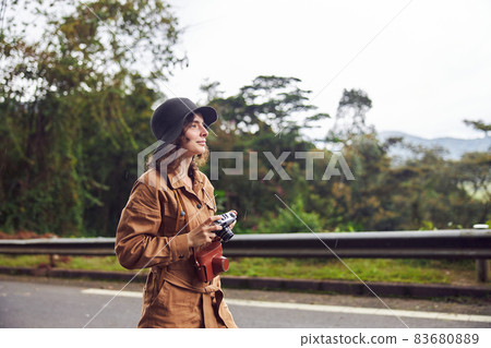 Beautiful young female caucasian tourist in equatorial africa jungles Beautiful young female caucasian tourist in equatorial africa jungles 83680889