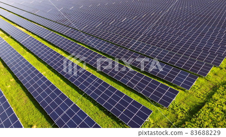 Aerial drone view flight over solar power station panels. Aerial drone view flight over solar power station panels. 83688229