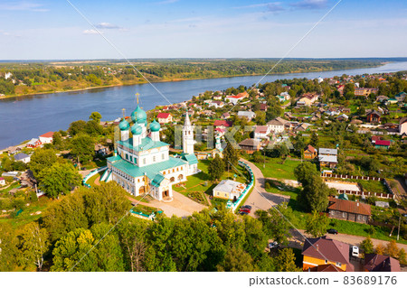 Aerial view of Tutayev on Volga River with Resurrection Cathedral in summer 83689176