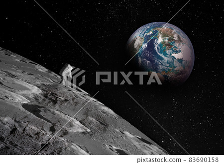 Small astronaut figure, clearly visible on the surface of the Moon, looks up into the sky at the distant Earth. Footprints confirm the presence of a person. Small astronaut figure, clearly visible on the surface of the Moon, looks up into the sky at the distant Earth. Footprints confirm the presence of a person. 83690158