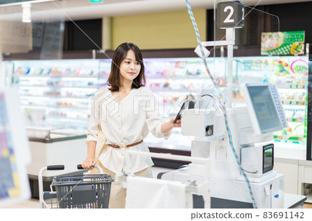 People who shop for groceries at supermarkets People who shop for groceries at supermarkets 83691142