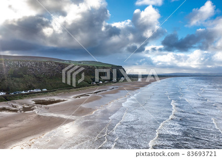 Aerial view of Downhill beach at County Antrim coastline - Northern Ireland 83693721
