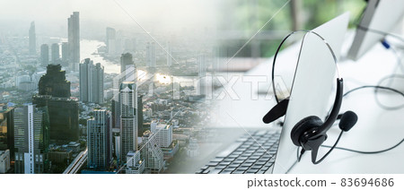 Headset and customer support equipment at call center ready for actively service Headset and customer support equipment at call center ready for actively service 83694686