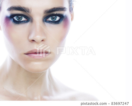 young beauty woman with makeup like shiner on face close up isolated white background, problem teen 83697247