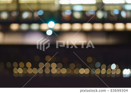Long exposure photography. Defocused image of Moscow cityscape in night time. Moscva river. Big traffic. Street is filled by cars. Beautiful blurred motion of subway train. yellow, blue black colors Long exposure photography. Defocused image of Moscow cityscape in night time. Moscva river. Big traffic. Street is filled by cars. Beautiful blurred motion of subway train. yellow, blue black colors 83699304