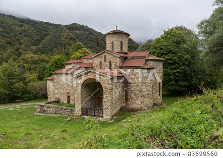 Old, abandoned temple in the Caucasus. Old, abandoned temple in the Caucasus. 83699560