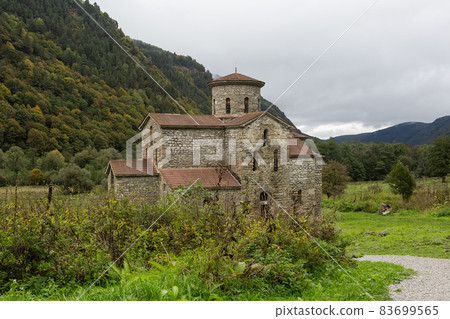 Old, abandoned temple in the Caucasus. 83699565