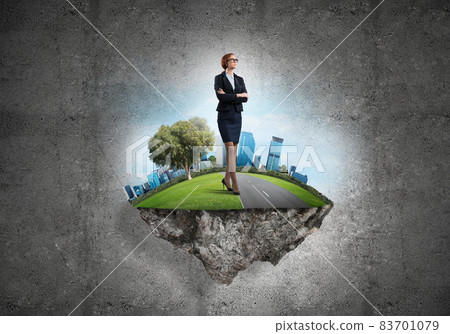 Confident lady boss and modern city as concept of eco green construction Confident lady boss and modern city as concept of eco green construction 83701079
