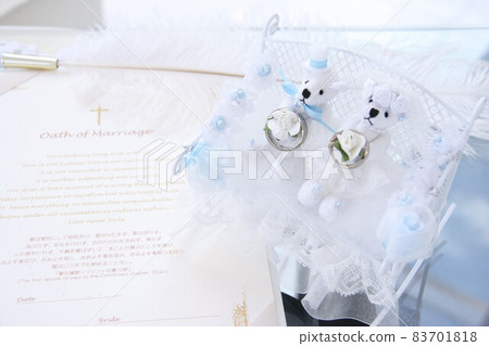Wedding ring and marriage pledge on a teddy bear 83701818