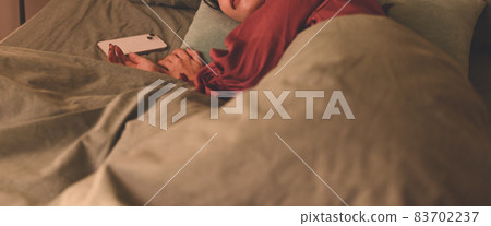 A woman in the bedroom 83702237