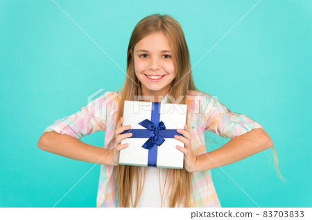 On boxing day. Small girl after shopping for gift. Little  83703833