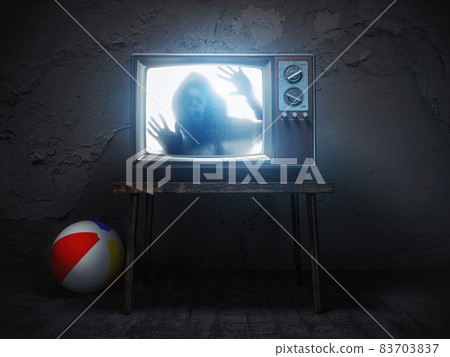 Horror scary movie concept. Ghost silhouette on screen of vintage tv in haunted house. 83703837