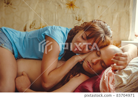 wife sleeps with her husband wife sleeps with her husband 83704971