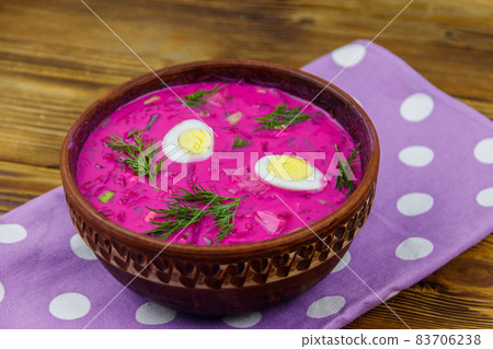 Cold beetroot soup on a wooden table Cold beetroot soup on a wooden table 83706238