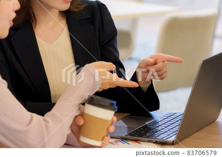 Young woman having a meeting Young woman having a meeting 83706579