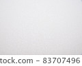 White wallpaper with fine irregularities 83707496