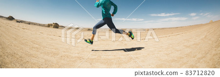 Fitness woman trail runner cross country running  on desert 83712820