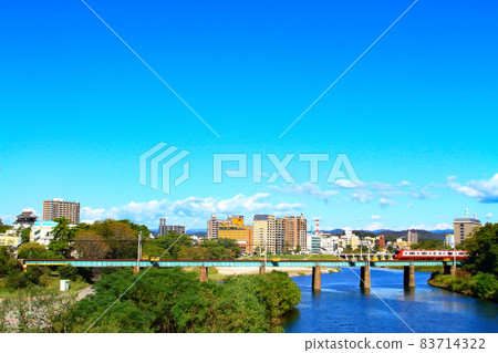 Okazaki cityscape and Meitetsu train scenery 83714322