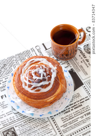 Coffee time with cinnamon rolls Coffee time with cinnamon rolls 83714347