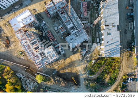 Construction of a high rise building with a crane Construction of a high rise building with a crane 83723589