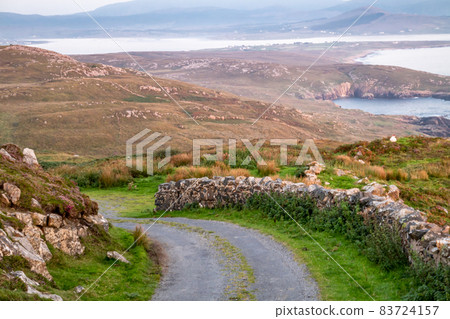 The coastal single track road between Meenacross and Crohy Head south of Dungloe, County Donegal - Ireland The coastal single track road between Meenacross and Crohy Head south of Dungloe, County Donegal - Ireland 83724157