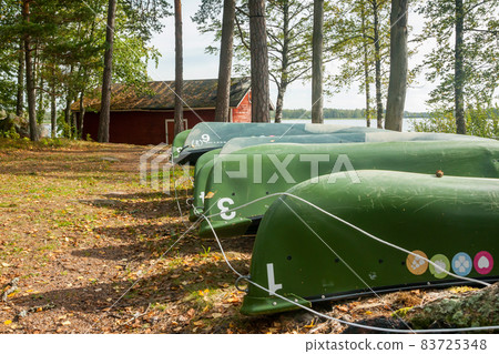KOUVOLA, FINLAND - SEPTEMBER 20, 2018: Boats on the territory of Anjala manor. KOUVOLA, FINLAND - SEPTEMBER 20, 2018: Boats on the territory of Anjala manor. 83725348
