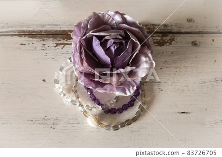 Purple rose corsage and beaded bracelet, antique shabby chic white table Purple rose corsage and beaded bracelet, antique shabby chic white table 83726705