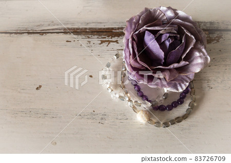 Purple rose corsage and beaded bracelet, antique shabby chic white table Purple rose corsage and beaded bracelet, antique shabby chic white table 83726709