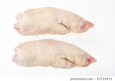 Two raw pork legs for cooking isolated on white background. Studio Photo 83729433