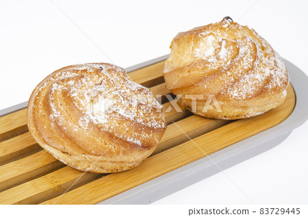 Fresh homemade cakes with cream and powdered sugar. Studio Photo 83729445