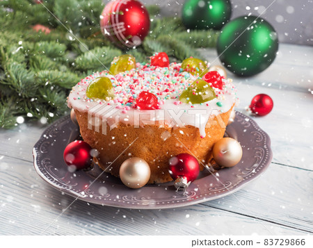 Artisanal Italian christmas cake with sweet decor and xmas ornament 83729866