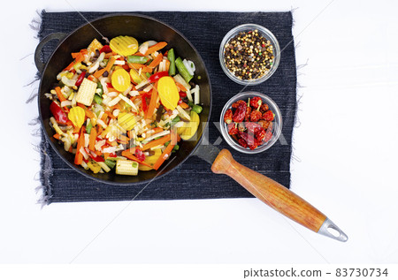 Seasonal vegetables platter in frying pan.Healthy food.Vegetarianism. Studio Photo. 83730734