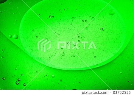bright green liquid background of bubbles with movement 83732535