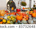 A lot of mini pumpkin at outdoor farmers market 83732648
