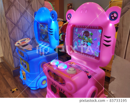 KUALA LUMPUR - OCTOBER 5, 2021: Indoor arcade game machines. Well designed and has various colors to attract customers especially children to use it. 83733195