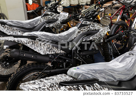new motorcycles at the factory in camouflage paint new motorcycles at the factory in camouflage paint 83733527