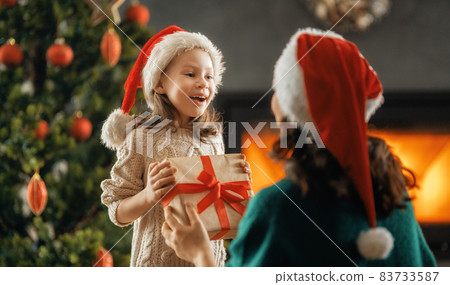 family celebrating Christmas family celebrating Christmas 83733587